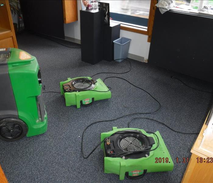 Two air movers on the floor
